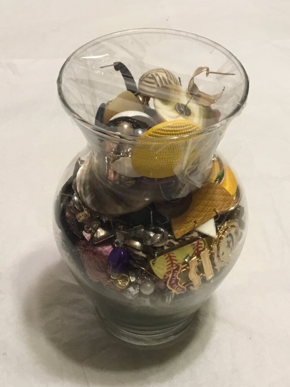 Nice vase full of old, used & broken single earrings & other earring pieces